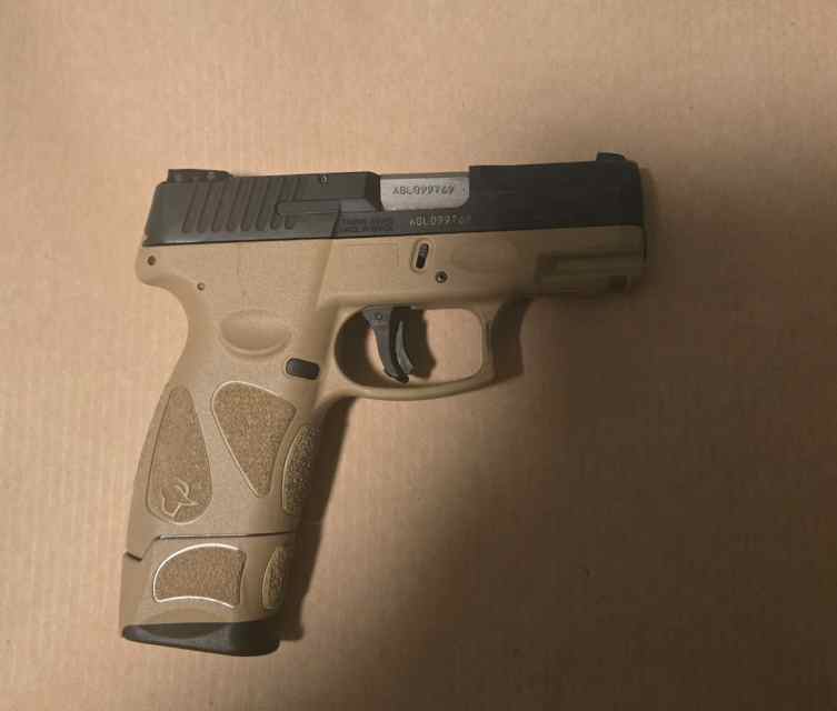 Taurus G2C w/ extended grip mag.