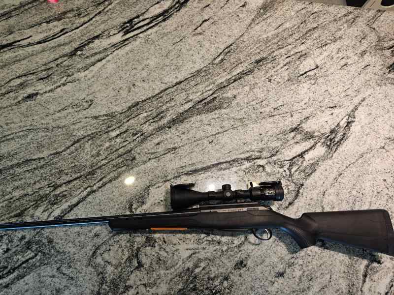Tikka t3x lite with sig 3x9x50