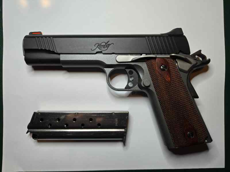 Left side with Kimber magazine