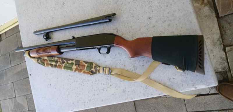 MOSSBERG 500 12 GA WITH TWO BARRELS
